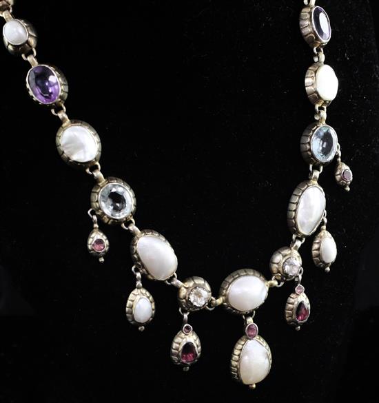 A late 19th/early 20th century? continental silver gilt and multi gem necklace, 17in.